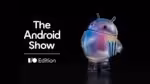 The Android Show 2026 I/O Edition key art featuring an iridescent Android mascot holding popcorn against a black background